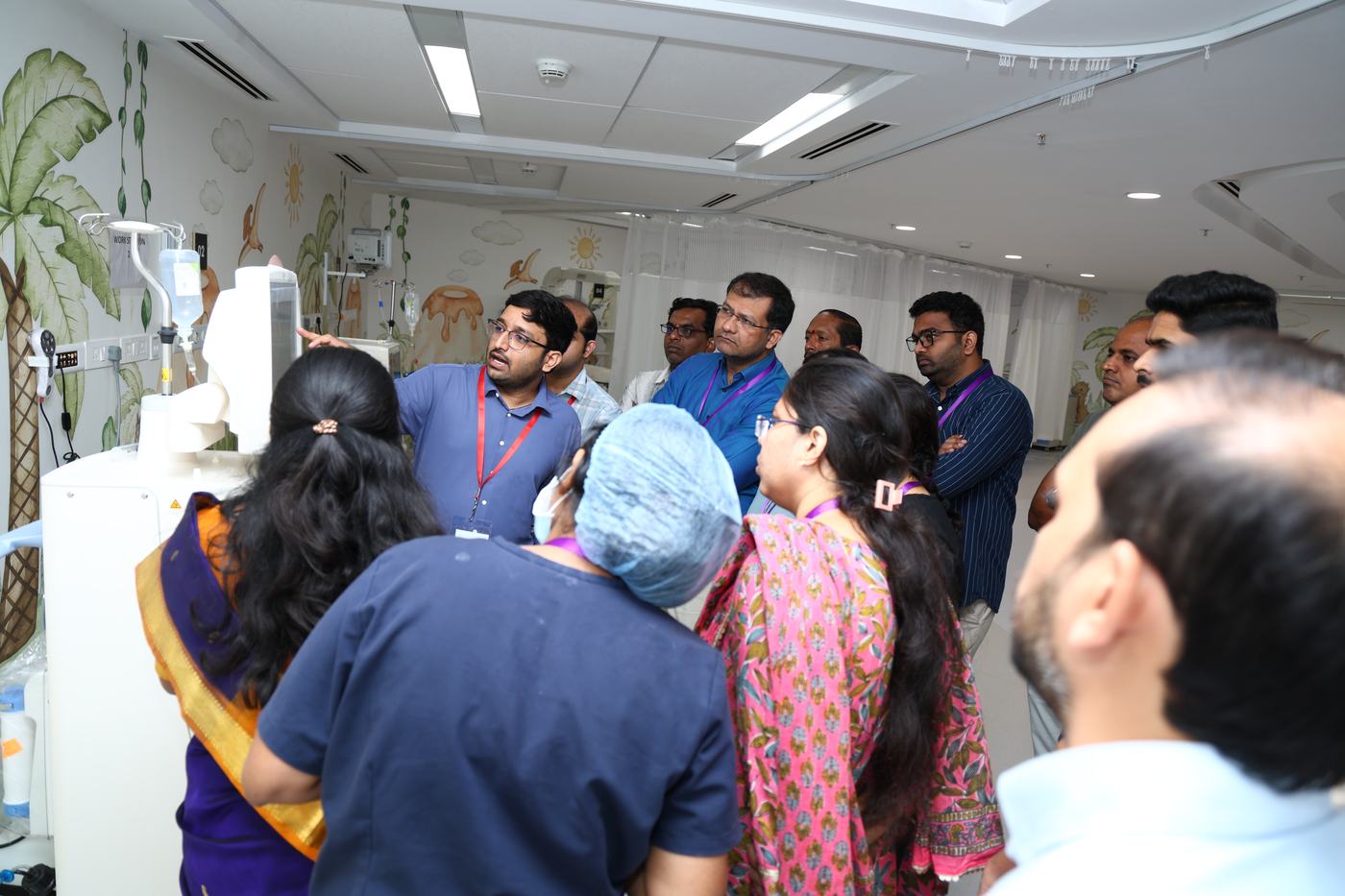 Dr. Suchit Jogu conducting a live demonstration in the Pediatric Intensive Care Unit at KIMS Cuddles, Kompally